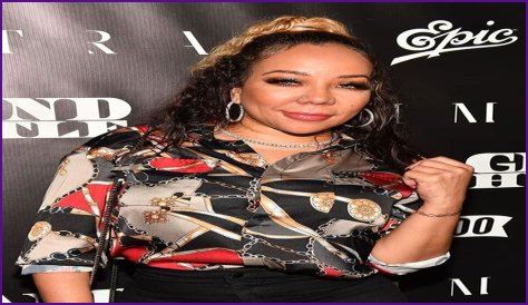  'Family Hustle' Star Tiny Harris Mourns Death of Her 'Brother' Sanchez Holmes and Honors Him with a Marching Band